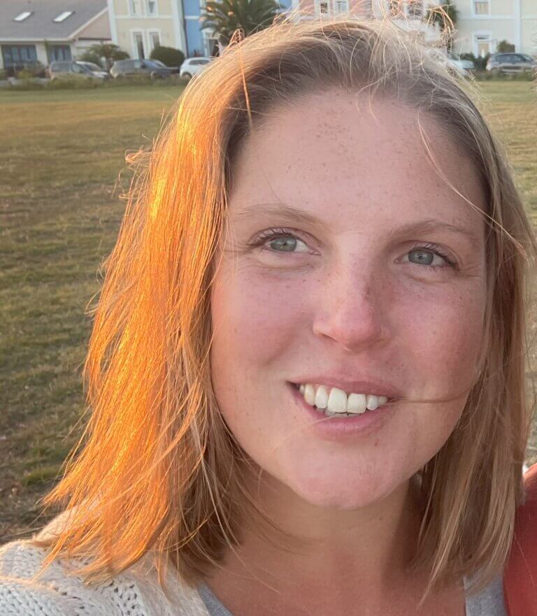 Headshot of Carly Sharpe, SEO Specialist at Ultimately Better