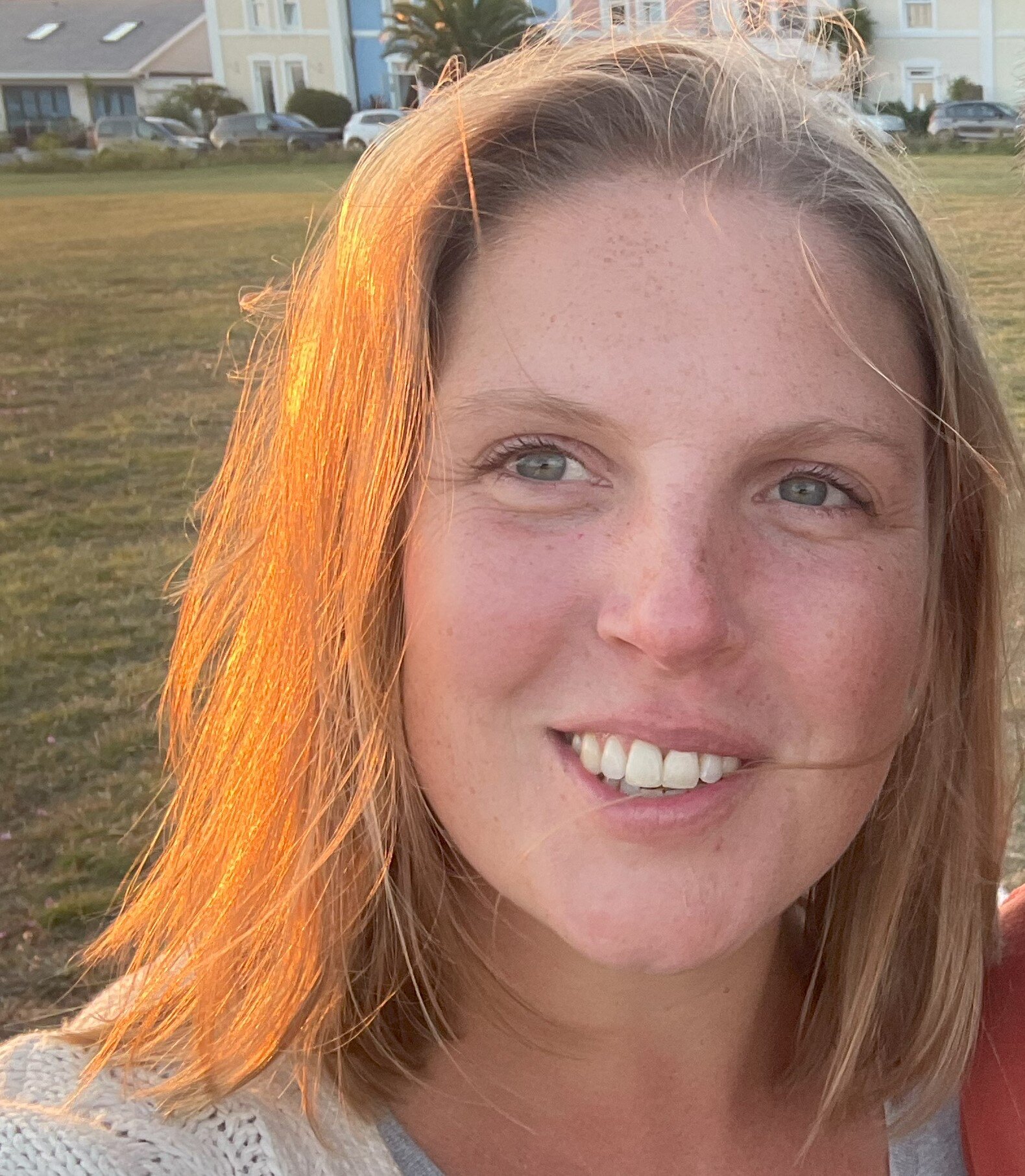 Headshot of Carly Sharpe, SEO Specialist at Ultimately Better